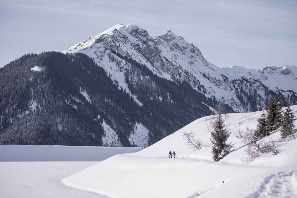 Snowshoeing is one of many winter activities in the mountains worth experiencing on a luxury ski holiday.