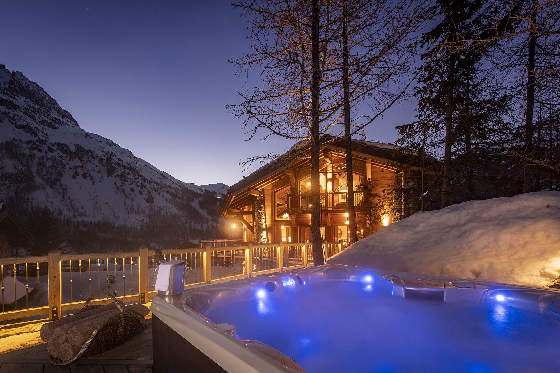 Christmas ski holiday to Chalet Machapuchare. Ski chalet hot tub at night.