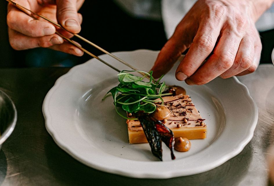 A chef plating a dish at Frenchie, a fabulous Verbier restaurant focussed on fine dining.