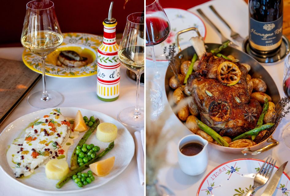 A fish dish with a white wine glass (left) and a chicken and potato dish with a red wine glass (right) at L'Ecurie, one of the best restaurants in Verbier