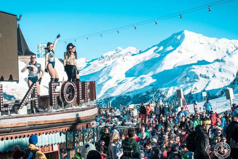 Dancers and patrons in the sun at Folie Douce in Val d'Isère.