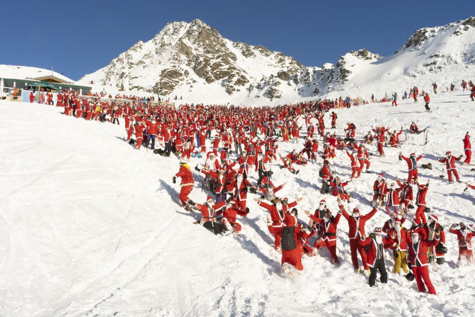 Hundreds of skiers and snowboarders dressed up as Father Christmas on the slopes of Verbier. 